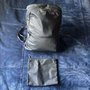 Tumi Black Backpack w/ Tracer Plate + Matching Pouch. Excellent condition.